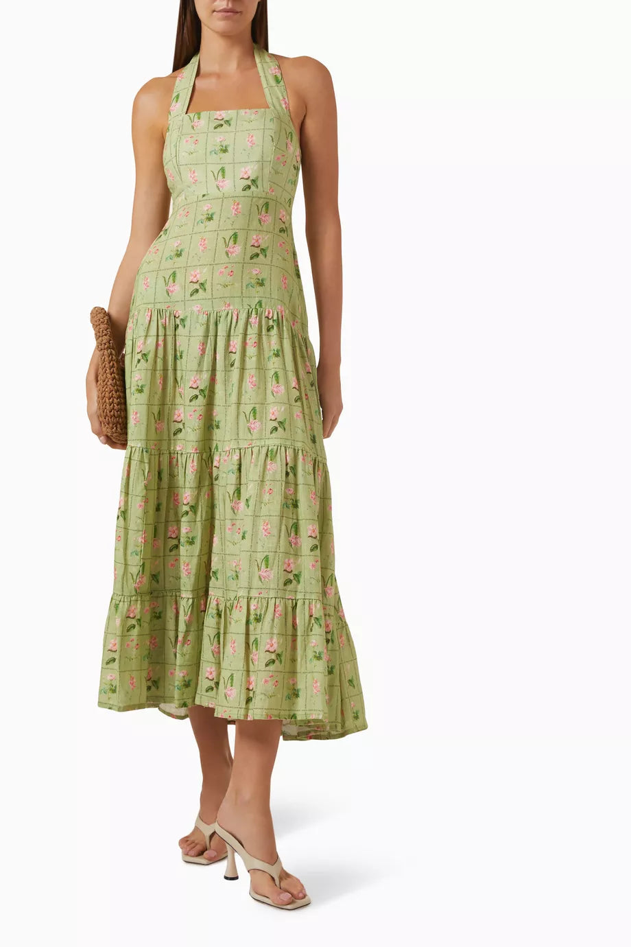 Introducing the Willow Printed Dress in Linen by Palm Noosa. Made from luxurious linen, this halter-neck dress boasts a flowy skirt and elastic back for a comfortable fit. The fitted bodice and waist highlight your curves. Perfect for a summery, effortless look with sandals and a straw hat.