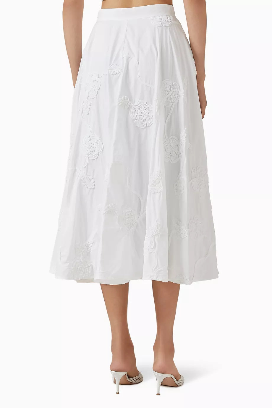 Elevate your wardrobe with this expertly crafted high-waisted maxi skirt by Rotate Birger Christensen, designed in sustainable organic cotton. Its voluminous, flared silhouette offers graceful movement, while tonal floral embroidery enriches the texture with subtle, refined detail. Thoughtful tailoring, including soft gathering at the waistband and a discreet side zipper, guarantees a smooth, flattering fit tailored for lasting comfort and style. 