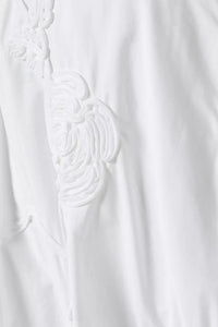 Elevate your wardrobe with this expertly crafted high-waisted maxi skirt by Rotate Birger Christensen, designed in sustainable organic cotton. Its voluminous, flared silhouette offers graceful movement, while tonal floral embroidery enriches the texture with subtle, refined detail. Thoughtful tailoring, including soft gathering at the waistband and a discreet side zipper, guarantees a smooth, flattering fit tailored for lasting comfort and style. 