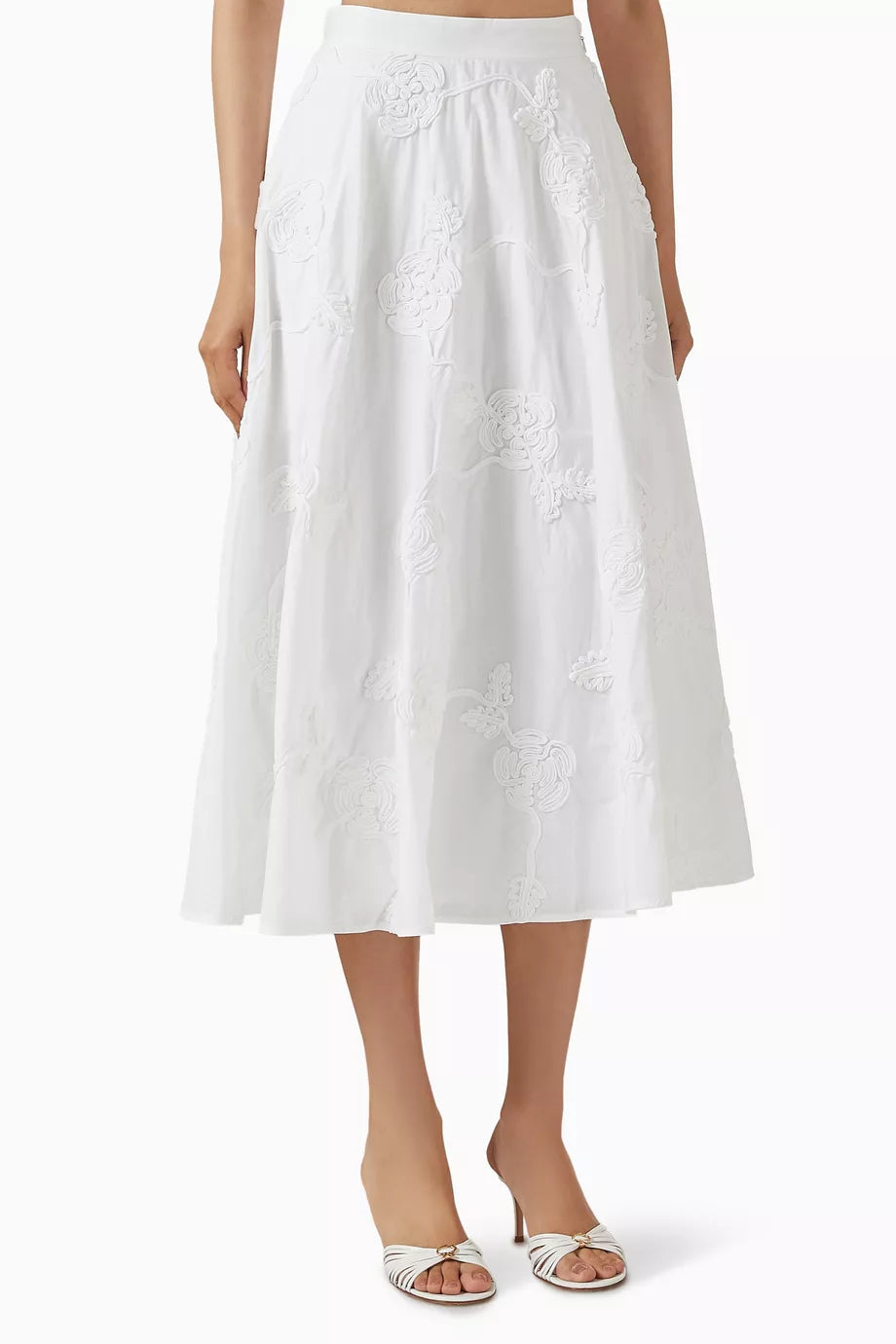 Elevate your wardrobe with this expertly crafted high-waisted maxi skirt by Rotate Birger Christensen, designed in sustainable organic cotton. Its voluminous, flared silhouette offers graceful movement, while tonal floral embroidery enriches the texture with subtle, refined detail. Thoughtful tailoring, including soft gathering at the waistband and a discreet side zipper, guarantees a smooth, flattering fit tailored for lasting comfort and style. 