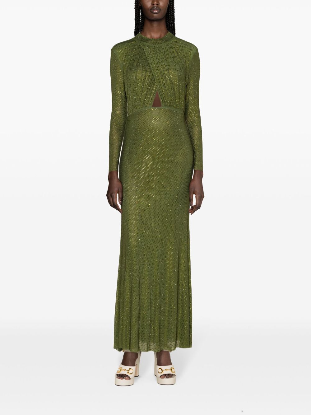 Transform into the epitome of elegance with our Olive Green Rhinestone Maxi Dress. Adorned with bling diamonds and featuring a slimming ruched design, this dress will make you feel like a mermaid princess. The O-neck adds a touch of sophistication while the hollow out details add a touch of flirtiness. Perfect for any special occasion.