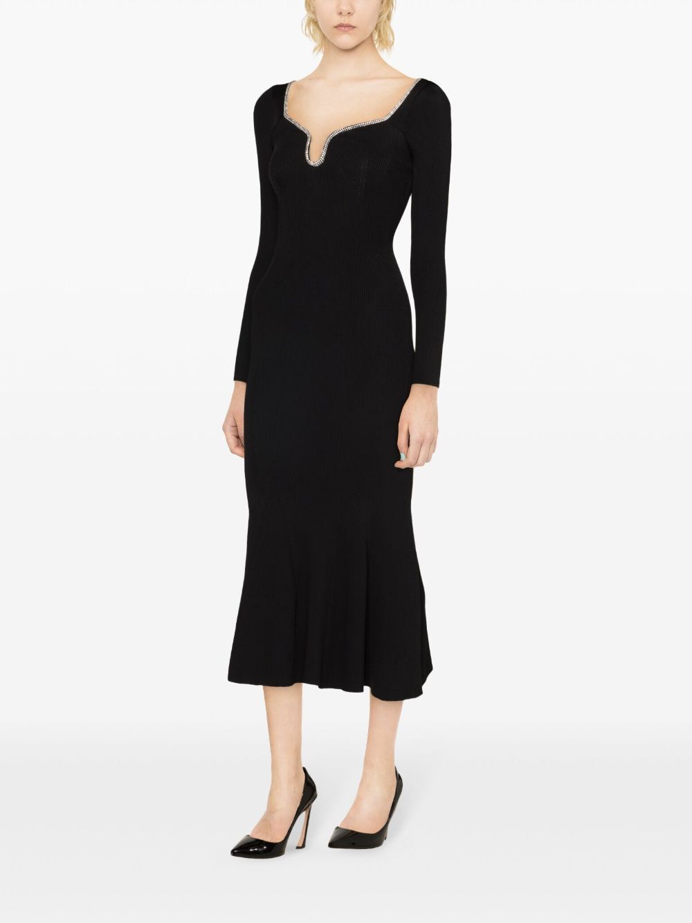 Expertly crafted by Self-Portrait, this flared midi dress is adorned with delicate crystal embellishments, adding a touch of elegance to any occasion. With its flattering silhouette and high-quality construction, this dress will make a statement and leave a lasting impression. Perfect for any fashion-forward individual looking to make a stylish and sophisticated statement.