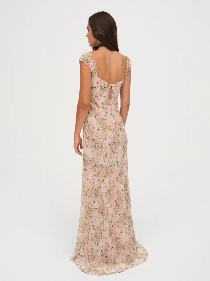 Love is in bloom with this ultra-romantic Emmaline floral maxi dress—a chiffon light yellow dress decorated in a dream-like floral print. Featuring ruched cups with an alluring ribbon lace trim at the sweetheart neckline—it's the perfect wedding guest dress to celebrate love.