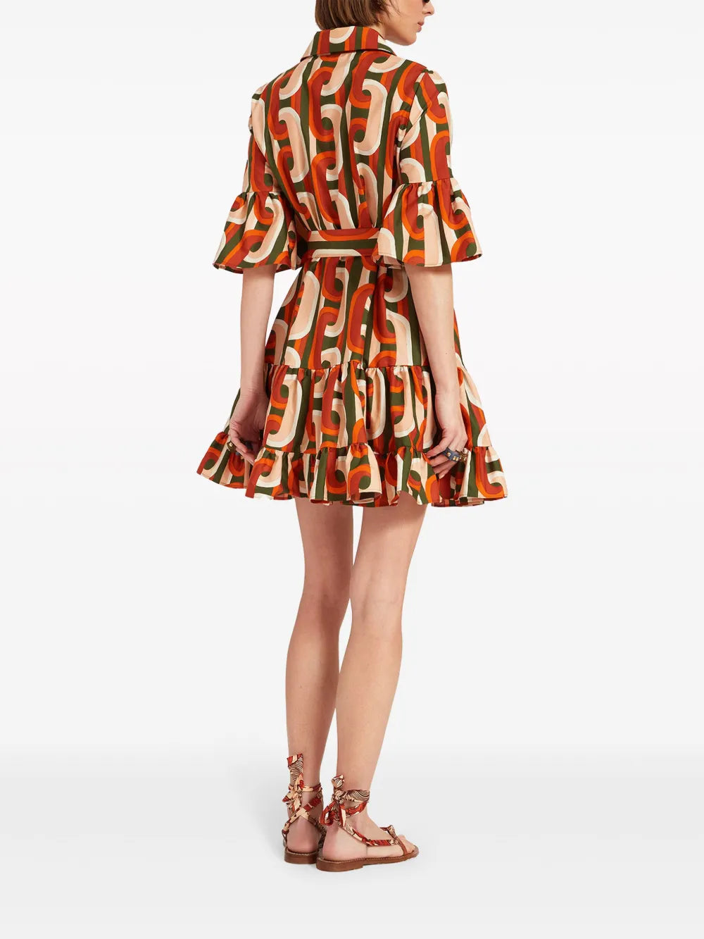 Elevate your everyday style with La DoubleJ's Choux cotton mini dress, a vibrant Italian-crafted piece that effortlessly blends playful design with timeless elegance. Featuring a striking geometric-pattern print in multicolour, this dress showcases a charming pointed collar, front button fastening, and short sleeves with flared cuffs that add a touch of whimsy. 