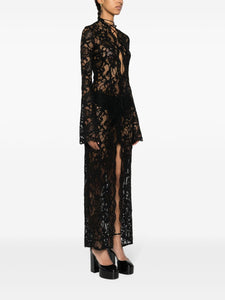 Get ready to make a bold statement with the Sally lace midi dress from MANURI! Featuring intricate lace detailing and a semi-sheer construction, this black dress is perfect for taking risks and standing out. The long sleeves and cut-out detailing with lace-up fastening add an edgy touch, while the front slit and straight hem create a sleek and daring look. Ready for your next adventure? This dress is just what you need!