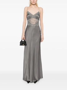 The Amoras Gown by Bec & Bridge combines elegance and allure with its satin-feel fabric and flattering V neckline. Featuring stretch lace at the midsection and gathered bust cups, it enhances your silhouette effortlessly. A delicate lace trim along the neckline adds a feminine touch, making this gown an ideal choice for any formal event where you want to stand out gracefully.