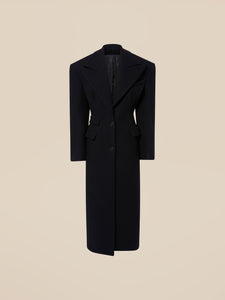 Get ready to elevate your wardrobe with the Black Long Coat by The Attico. Crafted in Italy, this coat features a classic silhouette, complete with large revers and a single breasted, two button design. Made with high-quality black wool cloth, it's an essential piece for any stylish individual. Stay warm and chic all season long.