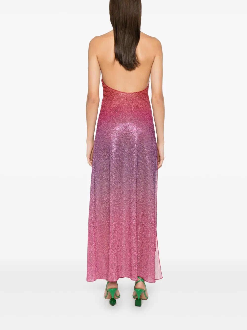 Elevate your wardrobe with this Italian-made Lurex midi dress, featuring a sophisticated dark pink hue and a subtle ombré effect. The halterneck design enhances your neckline, while the side slit adds a touch of allure and ease of movement. Crafted unlined for lightweight comfort, this dress combines elegance with contemporary style, perfect for refined occasions.