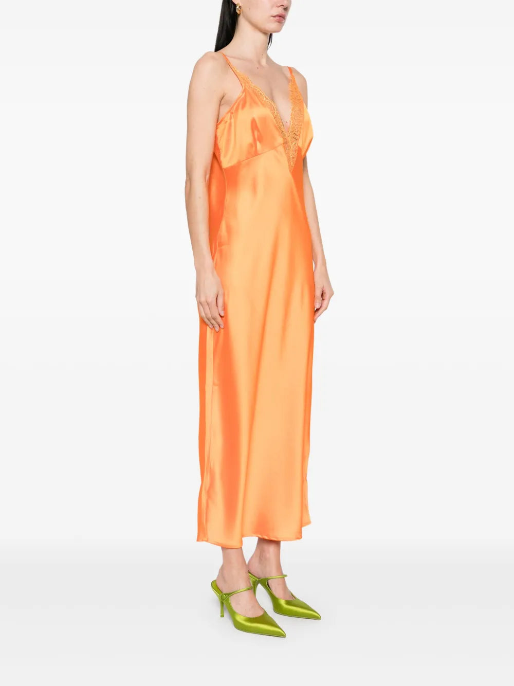 The Caetana dress combines sophistication and allure with adjustable shoulder straps and a plunging V-neck that enhances your silhouette. Detailed with scalloped eyelash lace trim and side splits at the hem, this dress adds a delicate, feminine touch while allowing graceful movement. Perfect for making a memorable impression at any event.
