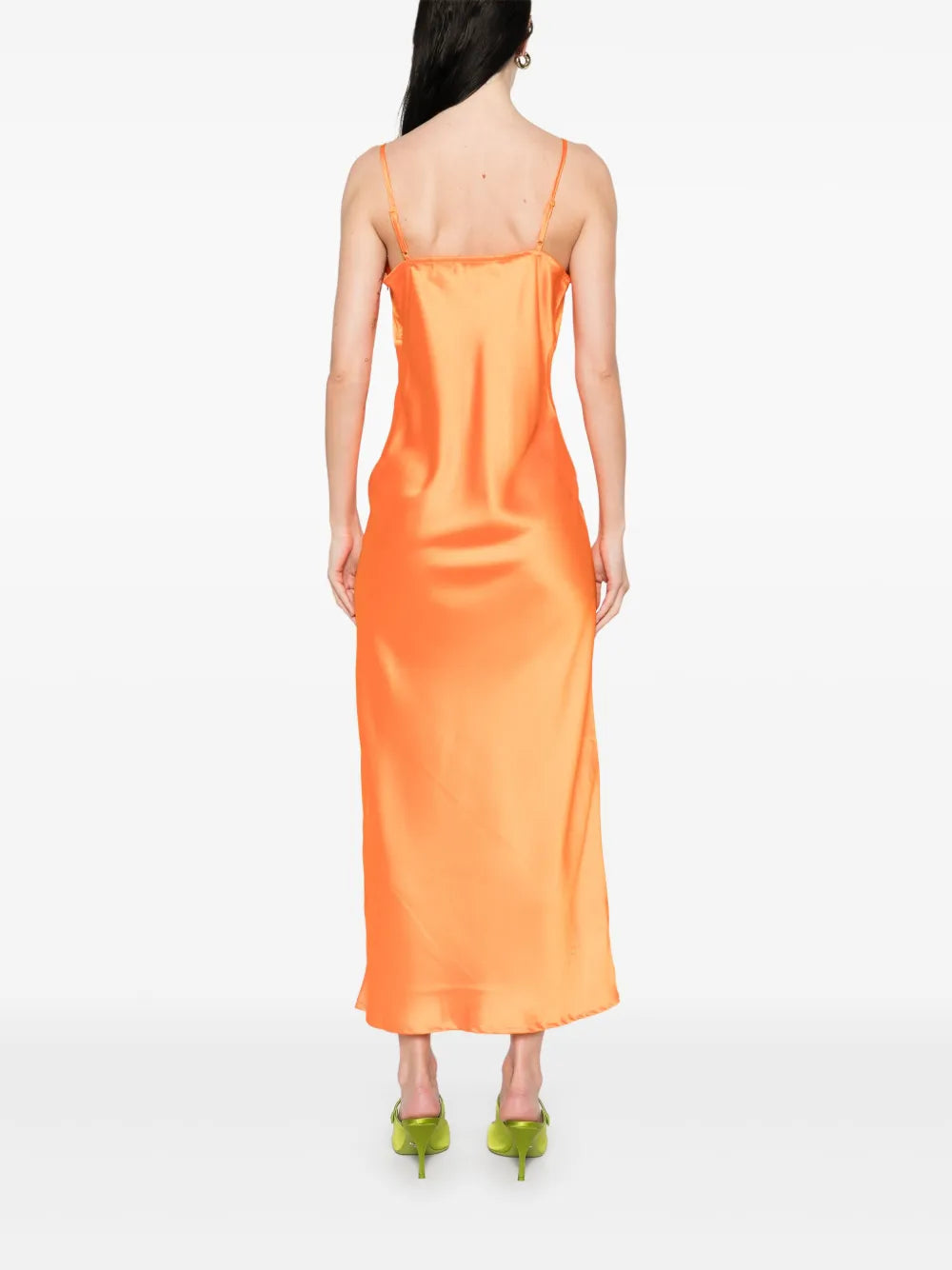 The Caetana dress combines sophistication and allure with adjustable shoulder straps and a plunging V-neck that enhances your silhouette. Detailed with scalloped eyelash lace trim and side splits at the hem, this dress adds a delicate, feminine touch while allowing graceful movement. Perfect for making a memorable impression at any event.