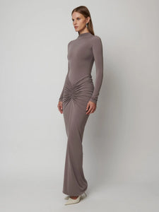 Indulge in the soft comfort and flattering fit of the Savina Maxi Dress. Made with stretch-jersey fabric for a figure-hugging silhouette, this versatile dress can easily transition from day to night. Elevate your wardrobe with this must-have piece!