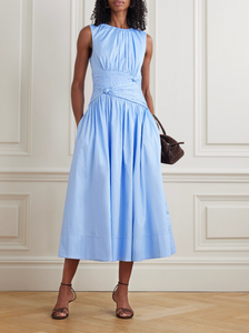 The Agatha Poplin Midi Dress by Aje features a flattering gathered, knotted waist that accentuates your silhouette. Crafted from soft cotton-poplin, it offers gentle pleats that add volume and flow elegantly to a midi length. In a versatile Powder Blue shade, this dress pairs beautifully with gold, silver, or pearl accessories, making it a perfect choice for both casual and refined occasions.