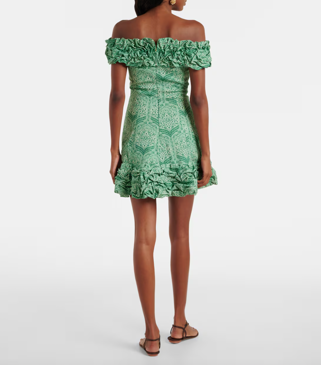 Discover the artistry of Agua by Agua Bendita's Jardín minidress, a stunning piece handcrafted by talented female artisans in Medellín, Colombia. This charming design features a soft cotton-blend poplin fabric with a playful ruffled hem and elegant off-shoulder neckline that flatters every silhouette. Each dress tells a story of skilled craftsmanship and celebrates the vibrant spirit of Colombian artistry. 