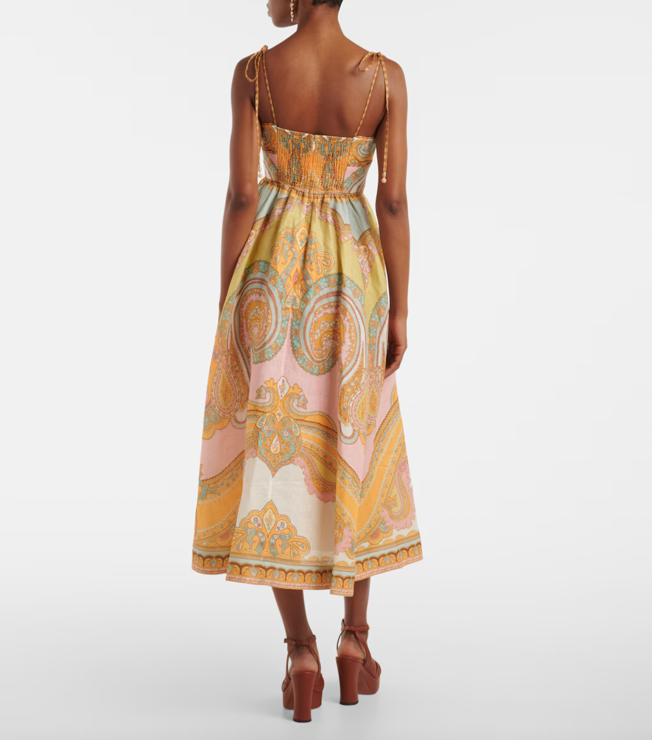 Elevate your wardrobe with the Maxine Picnic paisley linen bustier dress from Zimmermann. This midi-length dress showcases a timeless paisley placement print on breathable linen, highlighting a fitted bustier with delicate gathering and flat piping for a flattering silhouette. Self-tie straps offer adjustable comfort, while side seam pockets add practical charm. Perfect for warm days and stylish gatherings, this dress effortlessly combines elegance and ease.