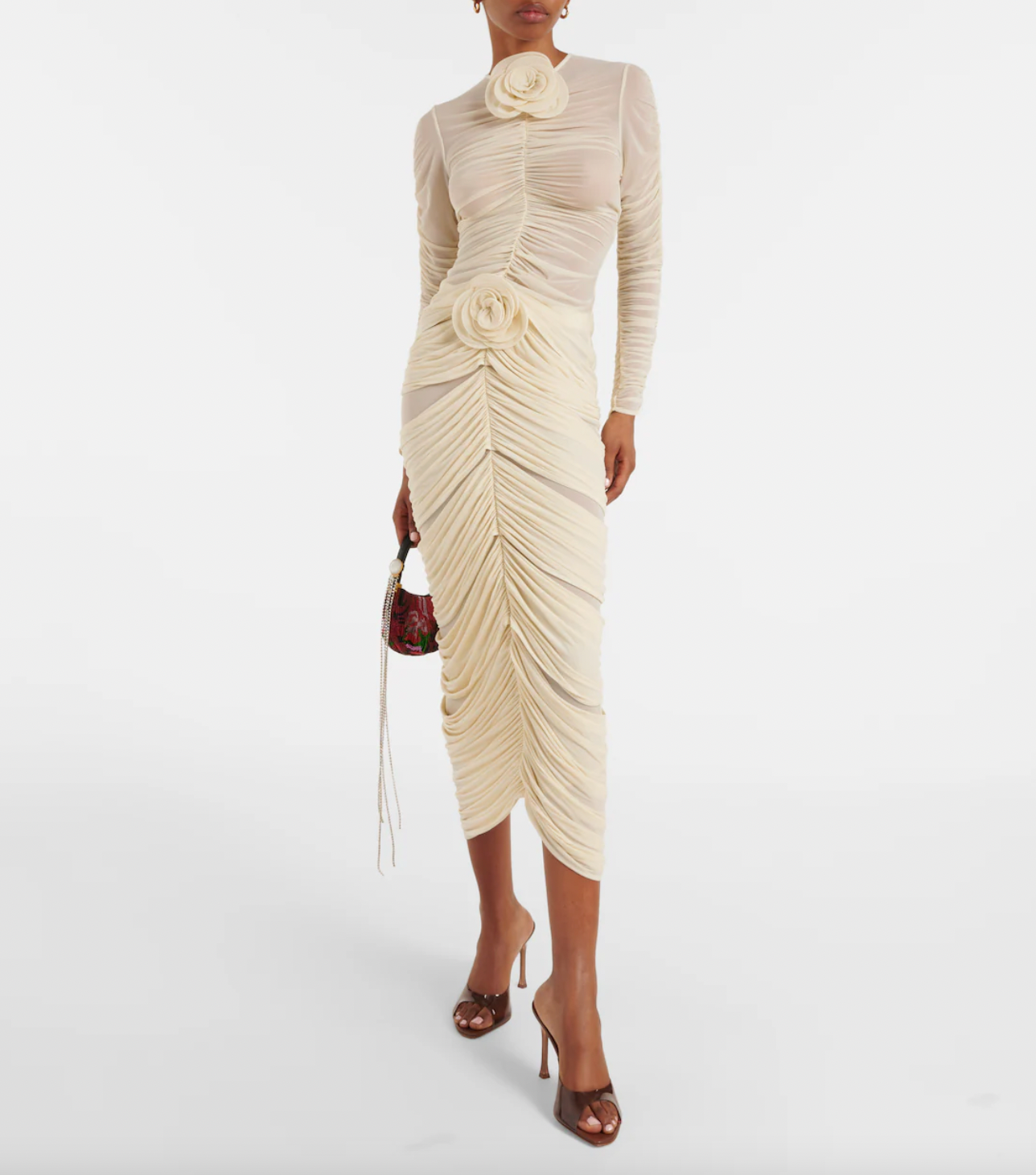 Indulge in the beauty of the Magda Butrym Floral-appliqué ruched midi skirt, crafted from a luxurious blend. With delicate floral appliqués and a flattering ruched design, this skirt is a must-have for any fashion-forward wardrobe. Available in a designer beige color and finished with a hook-fastening back closure. Care instructions: dry clean only. Made in Poland.