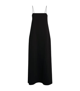 Effortlessly elegant, the Cenoa Maxi Dress from THE ROW is the perfect spring/summer staple. Designed with thin shoulder straps and a tall, floor length silhouette, this dress exudes an old money style that is both timeless and chic. A must-have for any wardrobe, the Cenoa Slip Dress offers versatile fashion for any occasion.