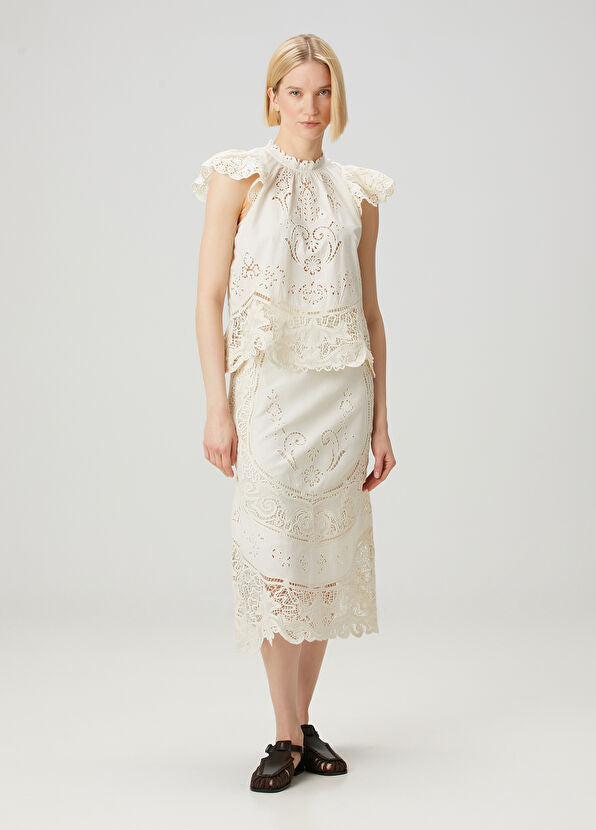Elevate your wardrobe with the Gianna Bone Lace Blouse by SEA, featuring a refined mandarin collar that adds subtle sophistication. Delicate lace and ruffle details enhance its tank top design, blending elegance with breathable comfort. Ideal for layering or wearing alone, this blouse offers a polished look perfect for both professional settings and stylish casual occasions.