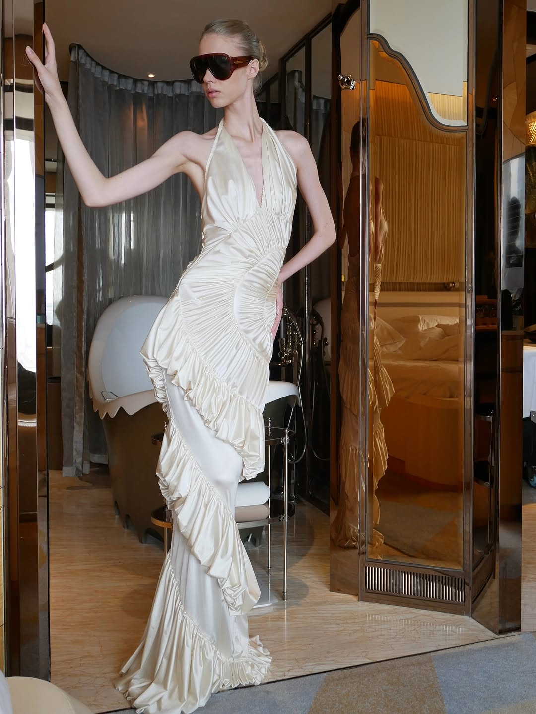 The Ammonite Gown by Datt combines elegance with practical comfort. Crafted from soft mesh that drapes beautifully against your skin, this fitted piece features a convenient side zip for effortless dressing. The included separate bikini lining ensures you're covered and confident underneath, making this gown versatile enough for any occasion where you want to feel polished and put-together.