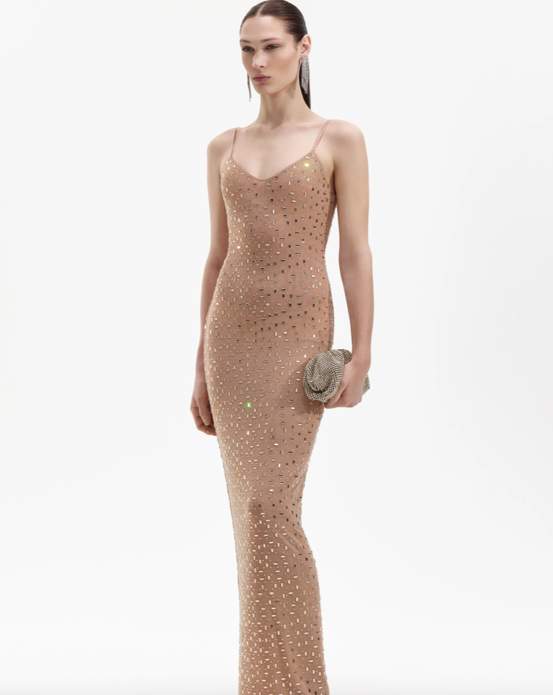 This stunning GOLD SQUARE RHINESTONE MESH MAXI DRESS features a sparkling mesh material adorned with intricate square rhinestones, making it the perfect dress for any glamorous occasion. Stand out while feeling luxurious and elegant in this exquisite and eye-catching dress.