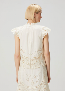 Elevate your wardrobe with the Gianna Bone Lace Blouse by SEA, featuring a refined mandarin collar that adds subtle sophistication. Delicate lace and ruffle details enhance its tank top design, blending elegance with breathable comfort. Ideal for layering or wearing alone, this blouse offers a polished look perfect for both professional settings and stylish casual occasions.