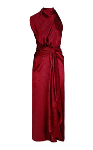 Elevate your style with the Warrior Tradition Draped Silk Maxi Dress by Johanna Ortiz. The slim fit, draped neckline, and one-shoulder design add a touch of sophistication, while the knotted waist and metallic knot pen create a chic silhouette. The dotted texture and midi hem add a touch of elegance to this lined dress.