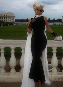 Introducing the Haley Gown, a stunning and exquisite piece that exudes luxury and sophistication. The long sleeves add a touch of elegance to the classic black satin, making it perfect for any formal occasion. With its alluring design, this gown is sure to turn heads and leave a lasting impression. Elevate your style with the Haley Gown.