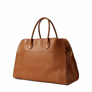 Introducing the Soft Margaux 17 Bag, a timeless piece of luxury crafted from the finest matte grained calfskin leather. With its softly structured design, belted gusseted side panels, and interior toggle closure, this top-handle bag is both functional and stylish. Elevate your wardrobe with this elegant and exclusive accessory.