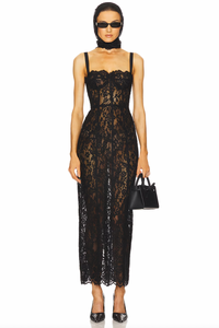 The Lace Column Dress by Helsa combines refined craftsmanship with daring elegance. Its delicate bustier and adjustable shoulder straps allow for a tailored fit, while the unlined, sheer fabric provides breathable comfort and a subtle reveal beneath. Featuring a hidden back zipper, this dress maintains a seamless silhouette, making it an ideal choice for sophisticated occasions where understated allure is key.