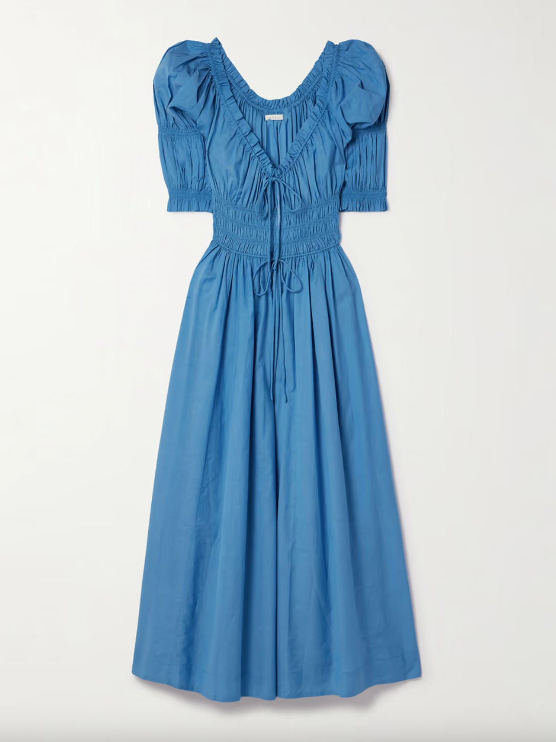 Indulge in the romantic and breezy style of the Ischia Dress. Made from a soft and lightweight cotton-blend voile, it features elegant puffed sleeves and flattering shirred panels that cinch in at the waist. Perfect for any occasion, pair with slides or mules for an effortless and chic look.