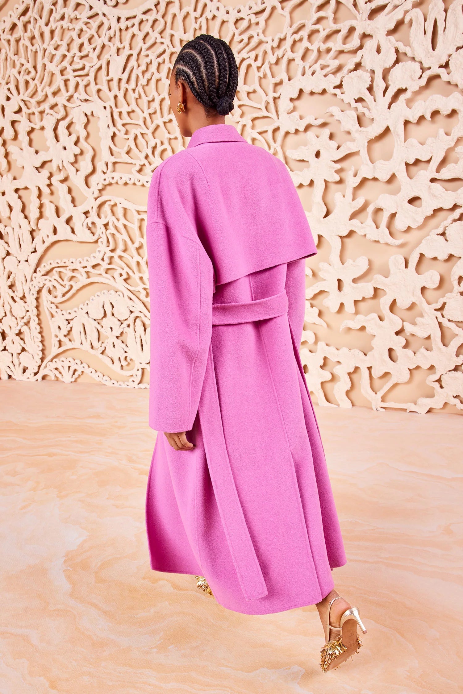 Stay warm and chic in the Romi Coat by Ulla Johnson. Crafted from luxurious double-faced wool blend with a touch of cashmere, this Flora pink coat features a longline silhouette, storm flap overlay, and a single-breasted design. Complete with side pockets and a removable belt to accentuate your figure.