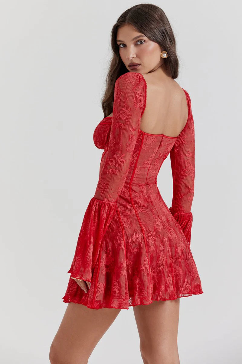 Get ready to turn heads in the Mini Dress Annalisa! With elegant flare sleeves, a daring backless design, and a fashion-forward square collar, this dress is perfect for any occasion. The stunning lace and pleated details add a touch of sophistication to this must-have piece. Elevate your style with this beautiful and versatile mini dress.