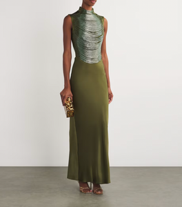 Elevate your wardrobe with the Multi Beaded Taraji Blouse by Cult Gaia, featuring exquisite hand-beaded arcs that highlight Cult Gaia’s commitment to artisanal excellence. The cedar-toned, stretchy side panels ensure a flattering fit while adding subtle contrast. Perfectly paired with the matching Chantel skirt, this blouse transforms any look with its intricate detailing and luxurious craftsmanship.