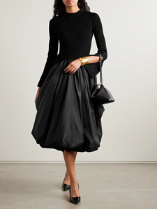 The Kenlie Ribbed-Knit and Taffeta Midi Dress by Simkhai combines a sleek, fitted bodice with a voluminous taffeta skirt that maintains its fullness thanks to soft pleats and a charming bubble hem. This elegant design offers a flattering silhouette that stays graceful whether you’re standing or sitting. Perfect for special occasions, pair it with pumps and understated jewelry to complete a sophisticated and captivating look.