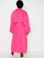 Load image into Gallery viewer, This pink ANOUKI oversized belted trench coat is designed with a wrap silhouette. Boasting a sparkling A logo to the buttoned cuff tab, it features large notched lapels, dropped shoulders, long sleeves, a back storm flap and centre vent, slip side pockets, belt loops and a self-fabric tie belt. Project Runway taught us how to &#39;make it work,&#39; now flaunt what ANOUKI made you and say Auf Wiedersehen to the other coat-estants.
