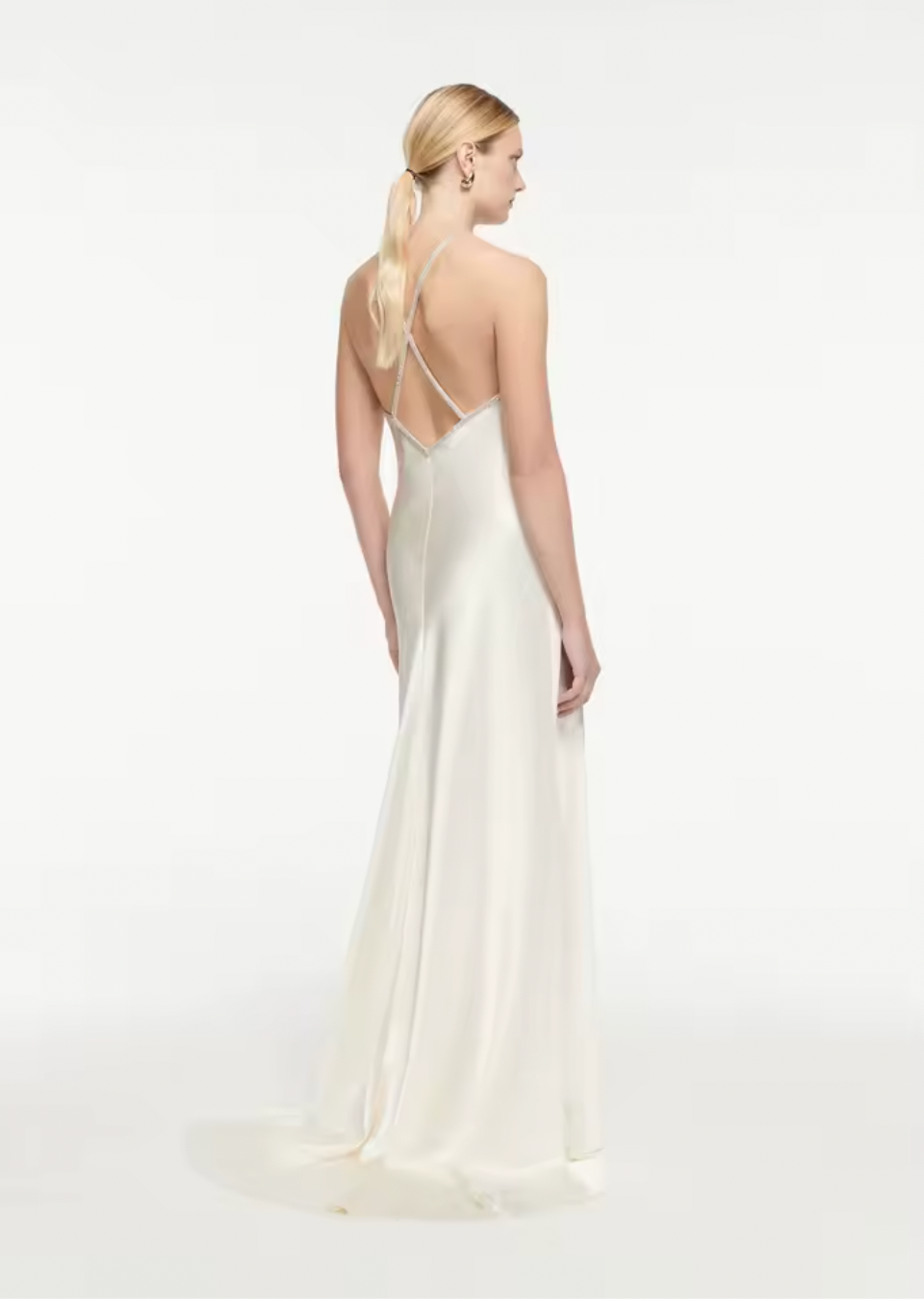 Expertly crafted from luxurious silk satin, this Embellished Gown by Roland Mouret features a stunning open back with lace-up detail and elegant A-Line silhouette. Perfect for any special occasion, this halter gown exudes timeless sophistication and will make you feel confident and beautiful.