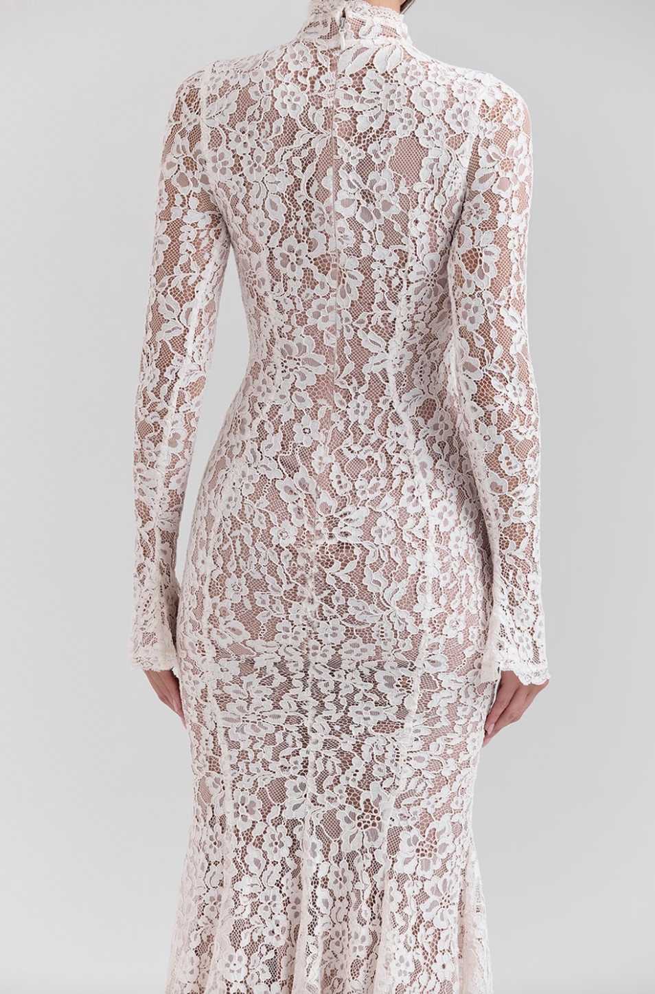 Get ready to turn heads with the Sophia Midi Dress. This dress combines modern flair and romantic elegance. Its body-hugging silhouette, high neck, and long sleeves beautifully highlight your shape while keeping it sophisticated. The ivory lace adds a touch of texture, and the fluted hem and cuffs add a playful twist to this timeless design.