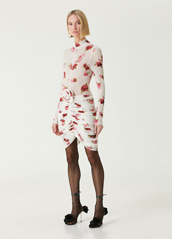 Elevate your wardrobe with the Printed Jersey Mini Dress by Magda Butrym, featuring delicate rose appliqués that add a touch of romance. Crafted from soft, comfortable jersey fabric, this dress offers a flattering fit enhanced by elegant draped panels at the hem. Its unique all-over print ensures no two pieces are exactly alike, letting you stand out with effortless sophistication. Perfect for daytime events or chic evenings, this mini dress combines style and comfort seamlessly.