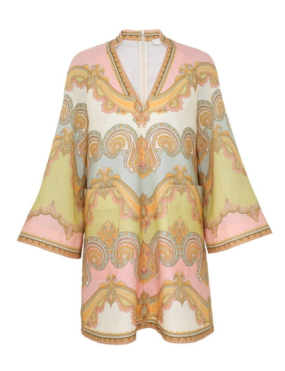 Elevate your resort wardrobe with the Maxine Tunic Mini Dress in Gold Paisley by Zimmermann. Crafted from breathable linen, this dress features a flattering deep V-neckline, stylish wide sleeves, and convenient patch pockets for effortless chic. The center back zip ensures a perfect fit, making it your go-to piece for both relaxed days and elegant evenings.