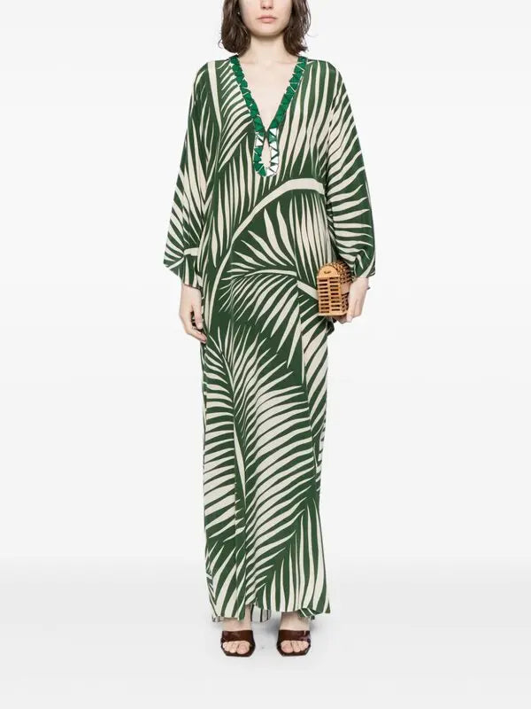 Escape to paradise with the Tropicanita Silk Dress, a sophisticated piece that brings tropical elegance to your everyday wardrobe. Crafted from luxurious silk, this dress features a striking white palm tree print that captures the essence of island living. The flattering V-neck with keyhole detail adds a touch of refinement, while long sleeves and a flowing straight hem create an effortlessly chic silhouette. Slip-on styling makes getting dressed a breeze. 