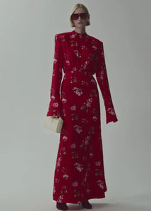Indulge in luxury with the MAGDA BUTRYM Silk Round Neck Gown. This stunning maxi dress features a bold and elegant floral print on luxurious silk fabric, creating a truly unique and sophisticated look. The gathered design adds an extra touch of glamour, making this gown perfect for any special occasion. Elevate your style and make a statement with this exclusive piece.