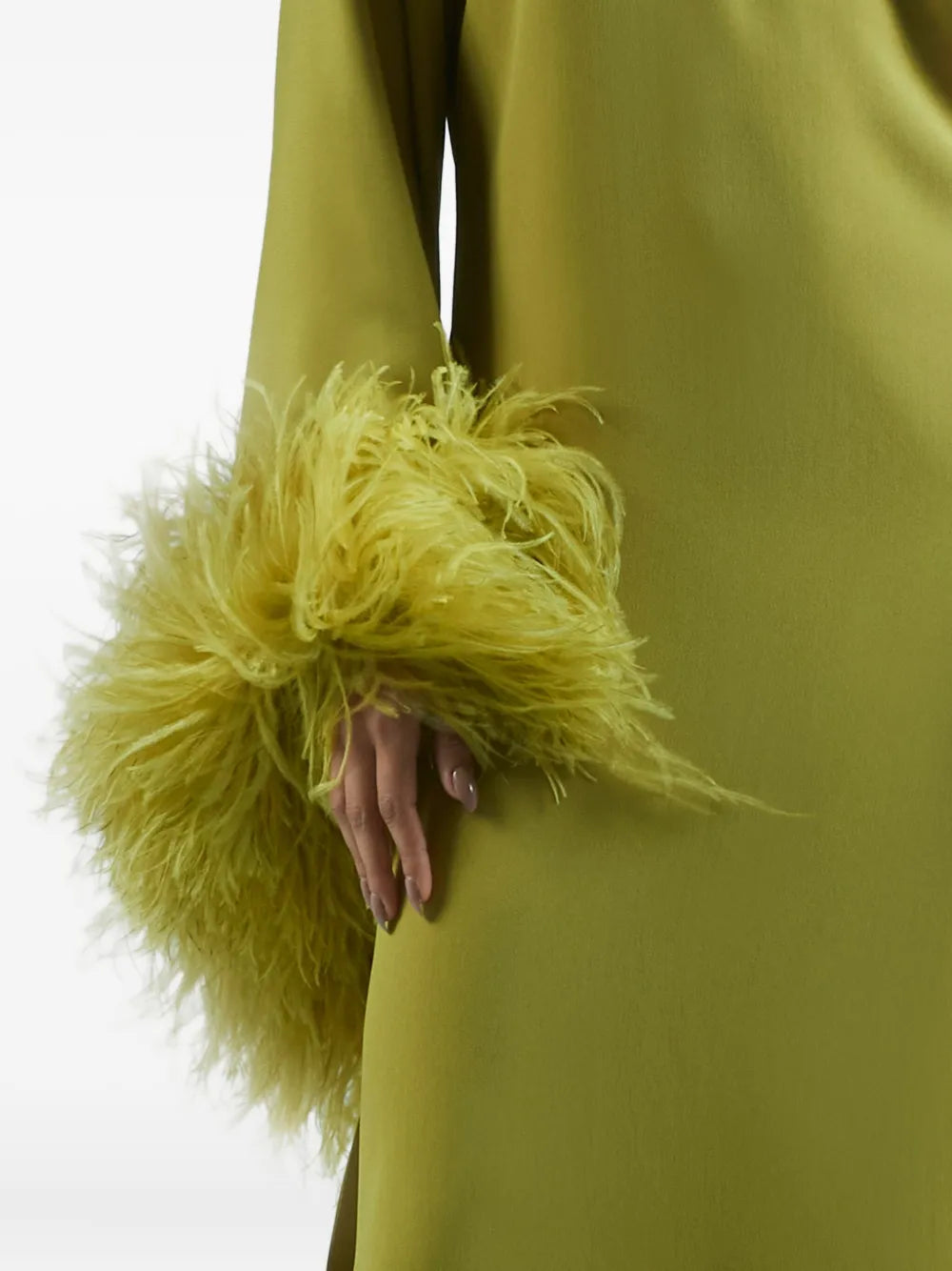 Elevate your style with the Baler Feather-trimmed One-shoulder Maxi Dress by Taller Marmo, crafted in Italy for exceptional quality. In a vibrant lime green, this floor-length gown features a striking one-shoulder neckline and an asymmetric sleeve adorned with delicate feather trim. Perfect for making a bold, elegant statement at any special occasion.