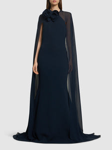 The silk blend long dress by Elie Saab features a non-detachable sheer cape that adds an elegant touch to your look. The beautiful flower appliqués at the neckline give this dress a unique and feminine vibe, perfect for that special occasion. Made of a high-quality silk in a flattering navy color, this dress is available in a range of sizes to suit every body type.