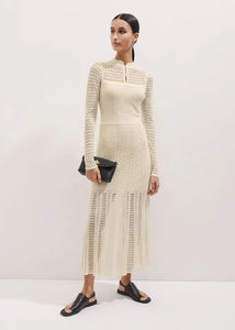 This knit maxi dress by ME+EM combines comfort and elegance with its long sleeves, gently raised waist, and flowing flared skirt. Crafted from a soft blend of cotton and responsibly sourced viscose, it offers breathable wear while supporting sustainable choices. Perfect for any occasion, this dress effortlessly balances style and ease, making it a versatile addition to your wardrobe.
