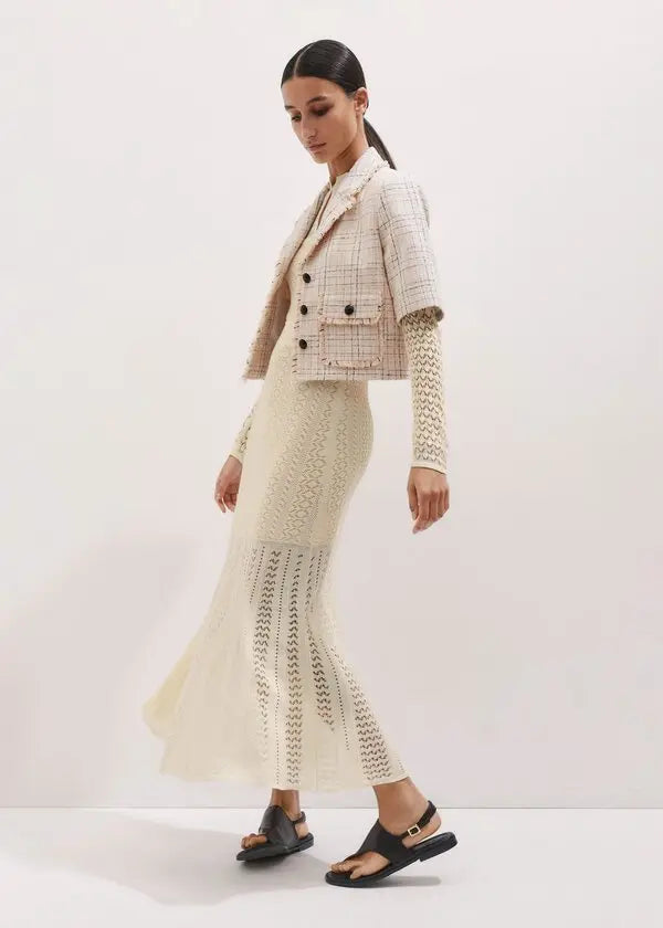 This knit maxi dress by ME+EM combines comfort and elegance with its long sleeves, gently raised waist, and flowing flared skirt. Crafted from a soft blend of cotton and responsibly sourced viscose, it offers breathable wear while supporting sustainable choices. Perfect for any occasion, this dress effortlessly balances style and ease, making it a versatile addition to your wardrobe.