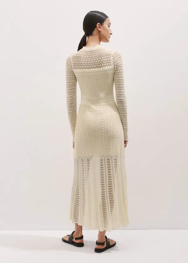 This knit maxi dress by ME+EM combines comfort and elegance with its long sleeves, gently raised waist, and flowing flared skirt. Crafted from a soft blend of cotton and responsibly sourced viscose, it offers breathable wear while supporting sustainable choices. Perfect for any occasion, this dress effortlessly balances style and ease, making it a versatile addition to your wardrobe.