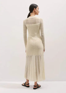 This knit maxi dress by ME+EM combines comfort and elegance with its long sleeves, gently raised waist, and flowing flared skirt. Crafted from a soft blend of cotton and responsibly sourced viscose, it offers breathable wear while supporting sustainable choices. Perfect for any occasion, this dress effortlessly balances style and ease, making it a versatile addition to your wardrobe.