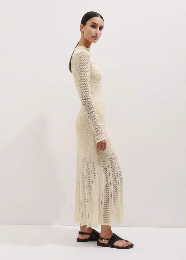 This knit maxi dress by ME+EM combines comfort and elegance with its long sleeves, gently raised waist, and flowing flared skirt. Crafted from a soft blend of cotton and responsibly sourced viscose, it offers breathable wear while supporting sustainable choices. Perfect for any occasion, this dress effortlessly balances style and ease, making it a versatile addition to your wardrobe.
