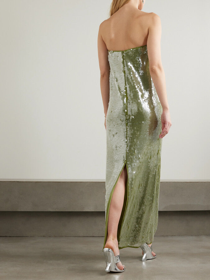 Elevate your evening with the Casey Paillette-embellished Maxi Dress by STAUD, a stunning strapless design that commands attention. Crafted from luxurious stretch-tulle, this gown features intricate paillette embellishments that catch the light beautifully, creating an enchanting shimmer with every movement. The rich green hue offers timeless sophistication while the strapless silhouette provides an elegant, modern edge. 