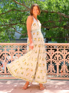 The Jacinta Maxi Dress in Multi showcases a sophisticated blend of French linen and mulberry silk, delivering both comfort and refined elegance. Its halter-neck design with a plunging V-neckline creates a graceful silhouette, flowing effortlessly for versatile wear from daytime outings to evening events. Functional side pockets add practical convenience without compromising style. This dress embodies a perfect balance of luxurious detail and relaxed sophistication.