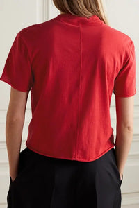 The Fedrino Organic Cotton-jersey T-shirt by The Row offers timeless comfort with a soft, breathable fabric perfect for everyday wear. Its relaxed fit and dropped shoulders provide effortless style, while the slightly wider crewneck adds a modern touch. The subtle back seam enhances the streamlined look, making this tee a versatile staple you’ll turn to season after season. Available in a variety of colors to suit your personal style.